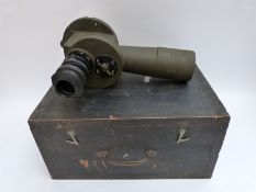 A WWII tank gun sight / periscope in case with three lenses
