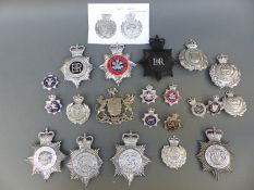 A collection of Welsh Police badges including Cardiff City, Monmouth, Newport Borough, Glamorgan,