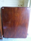 A 19thC mahogany tilt top table raised on tripod base (H74 x W123 x D86cm)