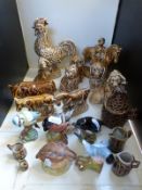 A collection of treacle glazed animals together with a selection of Beswick,