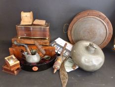 A collection of wooden boxes, stamps, plate warmer,