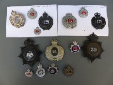 A collection of police badges including Wycombe Borough, Berkshire Constabulary,