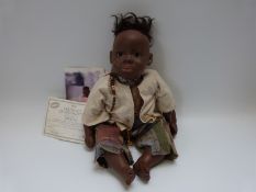 Karin Schmidt for Gotz black doll 'Sibulelo' with closed mouth, fixed brown eyes, short black hair,
