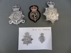 A collection of police badges relating to Isle of Man Constabulary