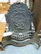 An ornate 19thC style firebasket with integral cast back and serpentine front (H89 x W77cm)
