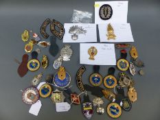 A large collection of European police badges and insignia including Italy, Spain Greece,