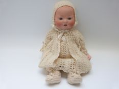 Armand Marseille bisque headed doll with open mouth, weighted blue eyes and jointed composite body,