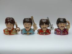 Kevin Francis / Peggy Davies Ceramics set of four limited edition gilded character jugs of the