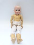 Armand Marseille bisque headed doll with open mouth, fixed blue eyes and articulated composite body,