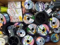 A quantity of fishing line including Trilene, Stren, Nemesis etc.