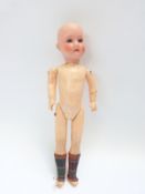 Armand Marseille bisque headed doll with open mouth, weighted blue eyes and jointed composite body,