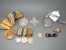 A WWI medal stamped 9169 Sjt A. E.