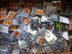 A large collection of fishing swivels and snap links