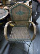 A set of cane furniture comprising coffee table and two chairs,