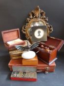 A collection of inlaid boxes, mirror, brass cormorant, Wills dominoes, silhouette,
