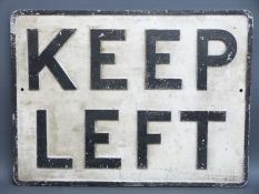 A vintage cast aluminium 'keep left' road sign, cast with name Royal Label Factory,
