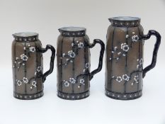 Three Victorian graduated jugs (largest 21cm)
