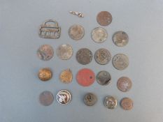 A collection of pay tokens including The Gloster Aircraft Company, a silver RAF sweetheart brooch,