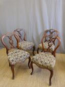 A set of four Victorian mahogany dining chairs with cabriole legs