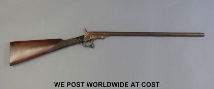 Flobert rim-fire saloon rifle with 22 inch octagonal barrel, proof marks to the underside,