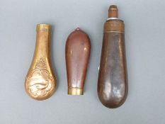 Three copper and brass pistol powder flasks,