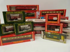 Twenty one Hornby, Wrenn, Bachmann, Lima and Replica Railways 00 gauge carriages and wagons,