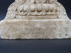 A Chinese carved stone figure of Guanyin,