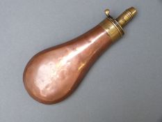 Sykes copper and brass powder flask, 20.5cm long.
