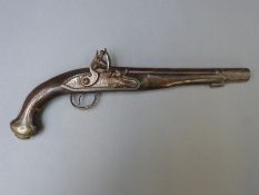 A late 18thC/ early 19thC flintlock pistol with engraved lock and hammer, indistinctly named 9.