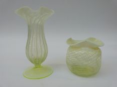 Two vaseline glass straw opal vases both with frilled rims, one on uranium glass foot,