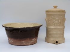 A patent stoneware water filter and a large pottery milk bowl (44cm diameter)