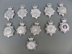 Ten police helmet badges including Shropshire, Liverpool and Bootle, Mid-Anglia Constabulary,