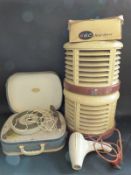 A pair of retro HMV beehive heaters,