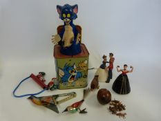 Eight tinplate, clockwork and similar toys including a Tom and Jerry music box,