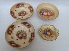 Three Aynsley Orchard Gold pedestal bowls, signed Brunt and Jones, 25.
