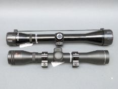 Two rifle scopes,