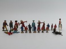 Twenty two Britains and similar lead model soldiers, cowboys,