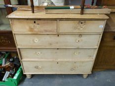 A Victorian pine chest of two over three drawers (H99 x W103 x D50cm)
