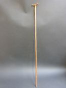 A 19thC cane riding crop.