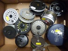 A quantity of fly reels, some with lines,