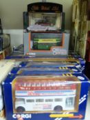 Eighteen Corgi diecast model vehicles including coaches, buses, Eddie Stobart,