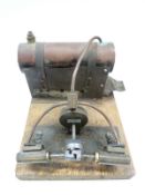 A stationary live steam engine with twin opposed oscillating cylinders,