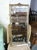 Ornate framed mirror with bevelled glass