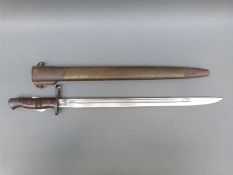 An American 1917 pattern bayonet in scabbard