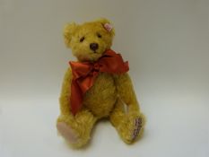 Steiff Original musical teddy bear 662607 with gold mohair, button to ear, tags and certificate,