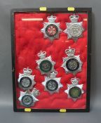 A display of eight police helmet badges UKAEA Constabulary, Lincolnshire,