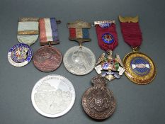 A quantity of local, Masonic and other medals including RMBI 1928 steward,