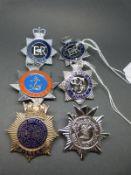 A collection of miscellaneous police badges including Liverpool Markets, United Kingdom (Bosnia),