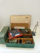 Hornby 0 gauge clockwork train set with GWR 4300 locomotive together with a tin plate signal and a