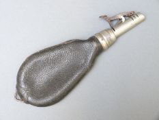 James Dixon & Sons leather and white metal shot flask with faux silver marks to spout and single
